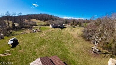 Aerial view showing the back yard and back of house