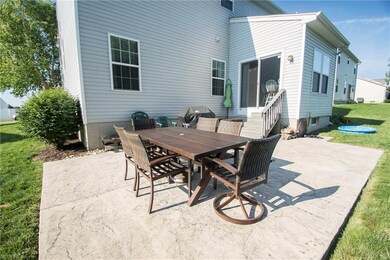 The stamped concrete patio is accessible from the 