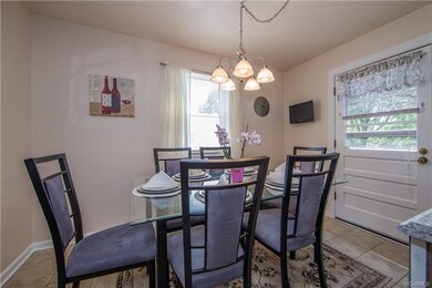 Eat-in area of kitchen that leads to the upper dec