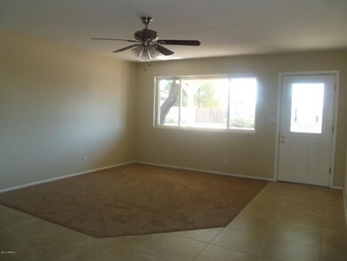 Living Room with New Carpet and Tile