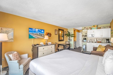 Bedroom featuring a textured ceiling