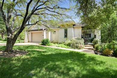 View of front of home featuring stucco siding, a 