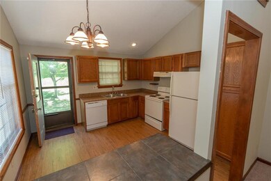Notice the built-in island/breakfast bar! Access t
