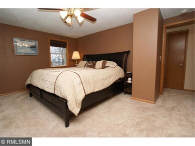 Master bedroom on top level with newer carpeting.