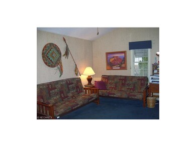 This is the family room with vaulted ceilings as w