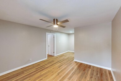 Unfurnished room featuring light hardwood / wood-style floors and ceiling fan