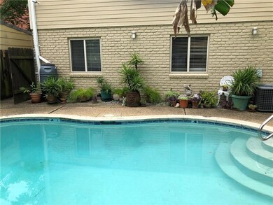 View of back of Unit 3 and sparkling pool - 4