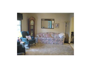 Very large Living room just off the foyer with a g