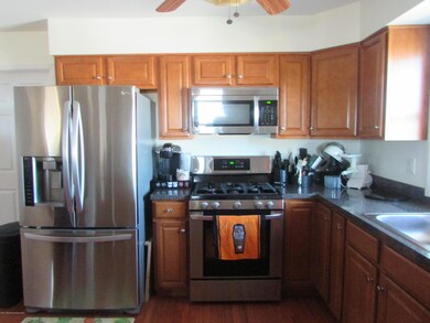 Kitchen has stainless appliances