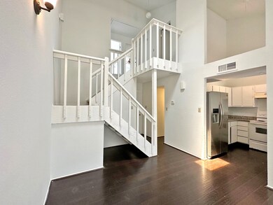 Open view with high ceilings when you walk in fron