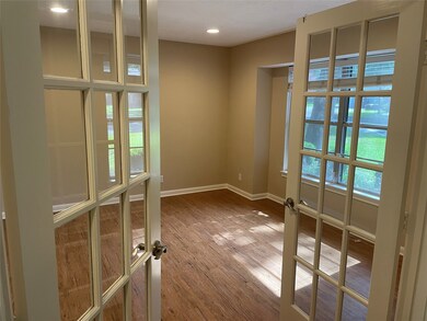 Office with french doors to the right as you enter the home.