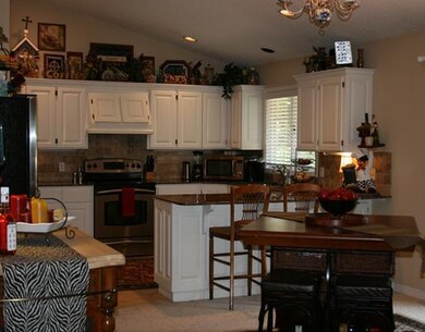 Kitchen. KITCHEN, DINING AREA AND LIVING ROOM ARE