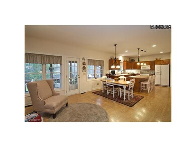 View of summer porch and outdoor kitchen.