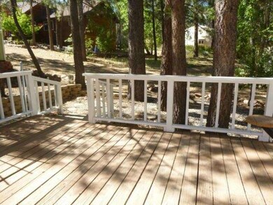 Another view of rear deck!  Looking at vacant land