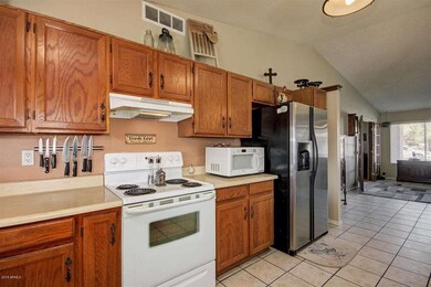Oak Cabinets/tile floor in Kitchen