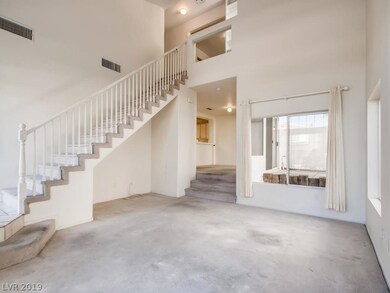 SUNKEN LIVING ROOM & STAIRCASE TO 2 BEDROOMS UPSTA