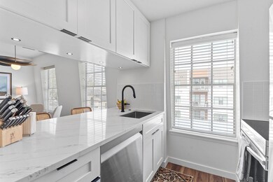 Kitchen with a wealth of natural light, white cab