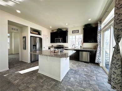 4551 N Quemoy St, Aurora, CO 80019 - photo 6