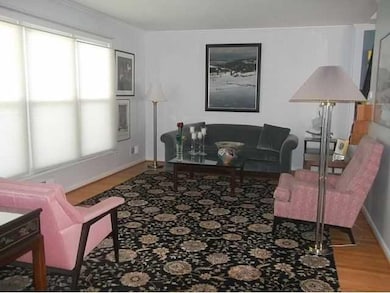 Other Spacious living room boasting 3 oversized wi