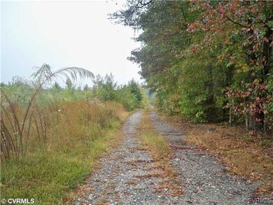 Exterior Front - Maintained gravel driveway for ea