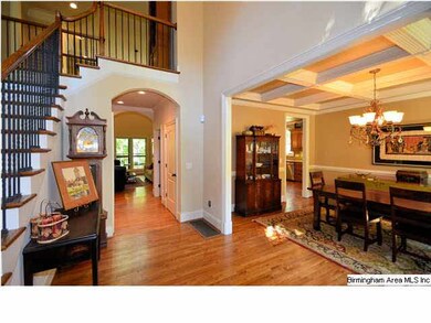 Hardwood floors throughout, open design and arched