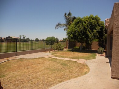 Backyard view looking onto golf course.
