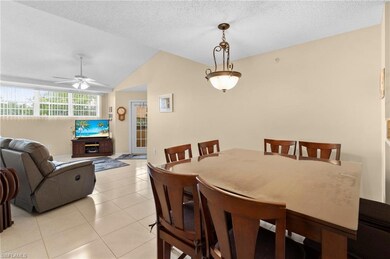 Dining room featuring lofted ceiling, ceiling fan,