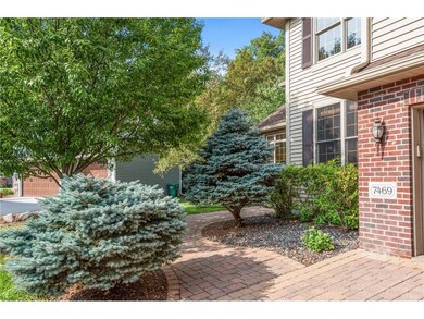 Beautiful landscaping and paved entrance