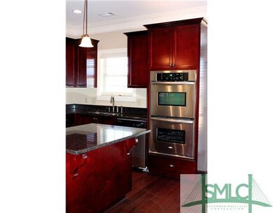Kitchen. This home comes with upgraded double oven