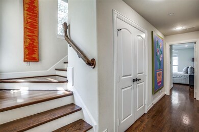 Spacious entry with natural light and hardwood flo