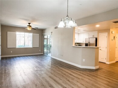 View from utility room that showcase living room and dining room combo