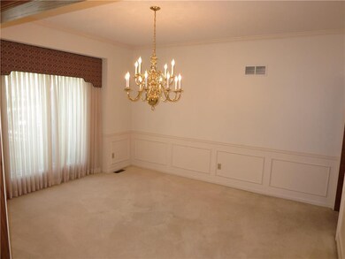 13 X 12 formal dining room off entryway and kitche