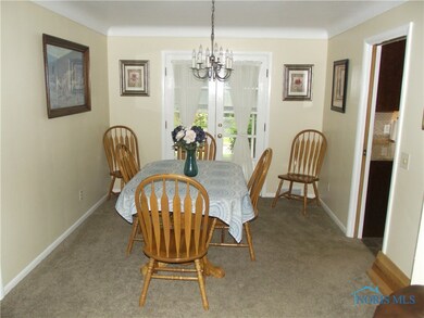Dining Room with Double Doors to Sunroom