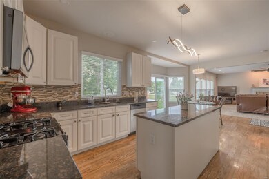 Plenty of storage and counter space in this lovely white kitchen