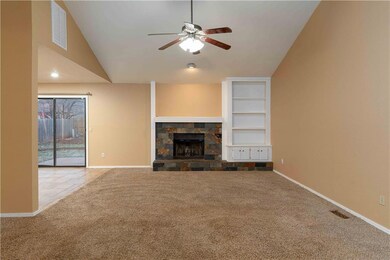 Vaulted ceiling and fireplace in the living room