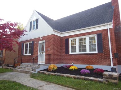 Beautiful landscaped front entry.