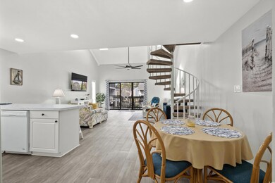 Dining space with light hardwood / wood-style floo
