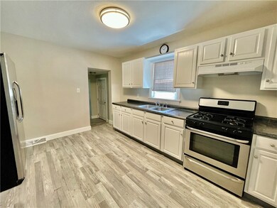 Updated kitchen with stainless appliances