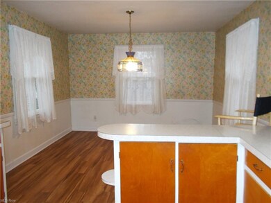 Eating area overlooks the back yard.