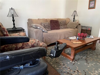 Boasts hardwood flooring.