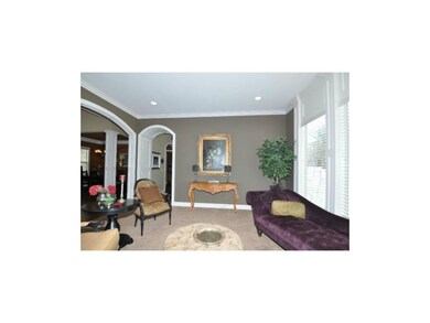 Living room is part of very open floor plan