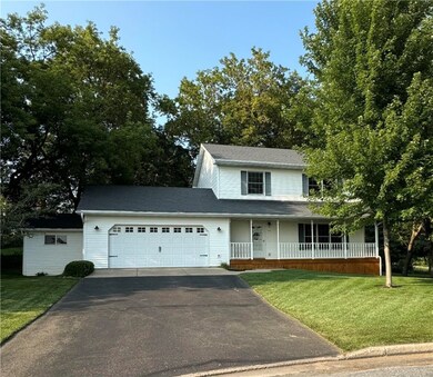 Welcoming covered front porch! Imagine sitting here drinking your morning coffee and looking at the amazing country views!
