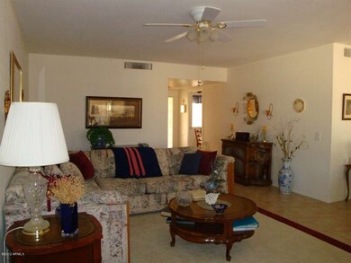 LIVING RM VIEWING TOWARD FRONT ENTRANCE