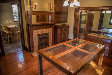 Dining Room has a decorative fireplace and operabl