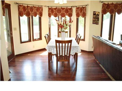 New Maple Mahogany wood floors adorn the majority 