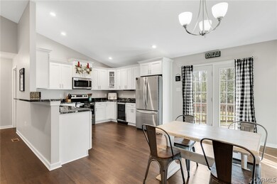 Kitchen featuring pendant lighting, stainless stee