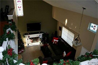 View of living room from top of stairs