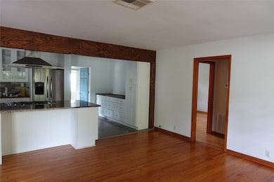The kitchen is open to the family room.