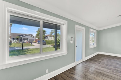 TONS OF NATURAL LIGHT WITH ALL IMPACT WINDOWS