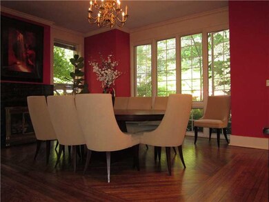 Dining Room. So many huge windows you feel like th